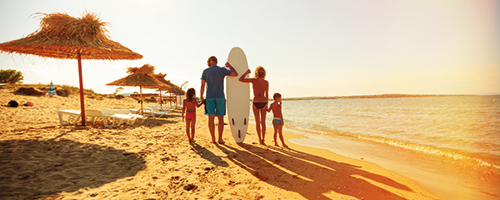 family on beach in florida